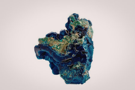 A vibrant blue and green mineral specimen with a unique crystalline structure, showcasing its...
