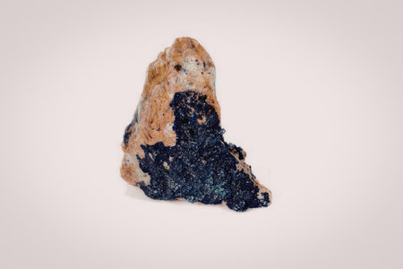 This image showcases a stunning piece of lapis lazuli rock, characterized by its deep blue color...