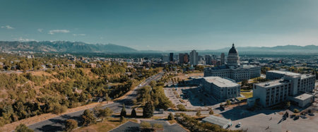 Aerial view of a city with a mountain range in the background