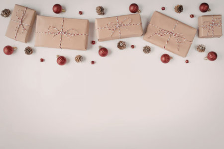 An arrangement of chocolates with berries and nuts on a white surface
