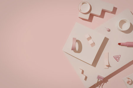 A creative arrangement of makeup and letters on a pink backgroundの写真素材