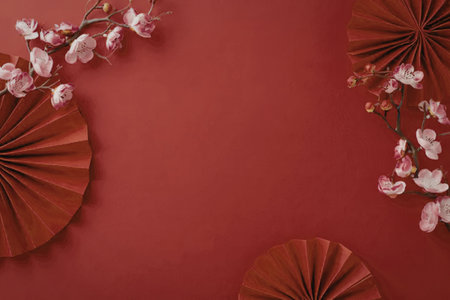 A red background with pink cherry blossoms and red paper fans