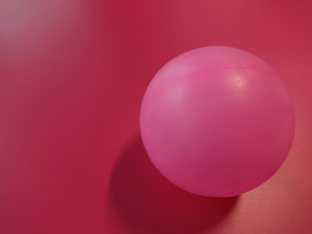 Pink Ball on a Pink Backgroundの写真素材