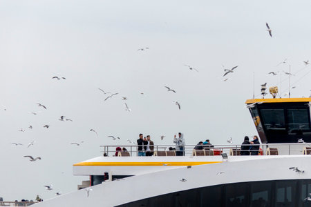 Close View of Boat Trip Vessel full of Tourists in Istanbul, Turkeyのeditorial素材