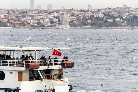 Close View of Boat Trip Vessel full of Tourists in Istanbul, Turkeyのeditorial素材