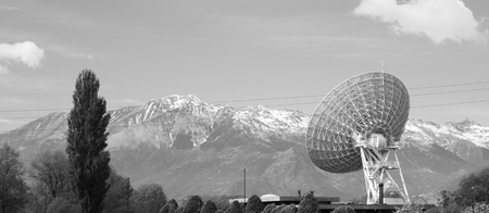 Large satellite dish in the Alps.の写真素材
