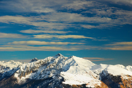 Scenic view of the Bergamasque Prealps with the peaks Mount Corna Piana (left), Pizzo Arera (the highest) and Cima di Menna (right). Bergamo Alps, Italyの写真素材