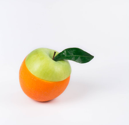 citrus and apple cut in half and coupledの写真素材