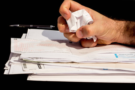 stack of paperwork and bills to payの写真素材