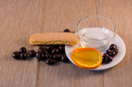 chocolates and a small cup of coffeeの写真素材