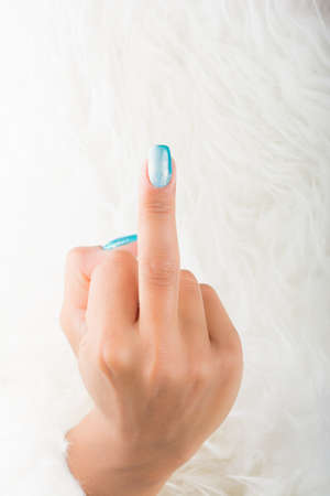 painted nails and wishing gestureの写真素材
