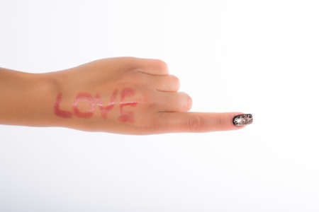 nails decorated with neutral colors and lipstickの写真素材