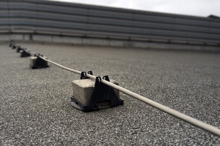 Lightning conductor rod mounted on blacks and used to divert the electrical current from a lightning...
