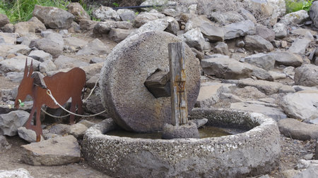 Old stone water fountain in the town of Pahang, Malaysia