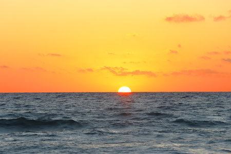Beautiful sunset over the sea. Sunset over the sea. The sun goes down over the sea.