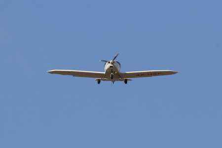 Airplane in the blue sky.