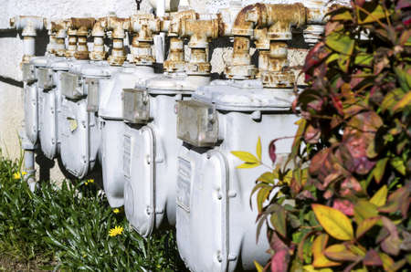 A group of gas meters at an apartment complex.の写真素材