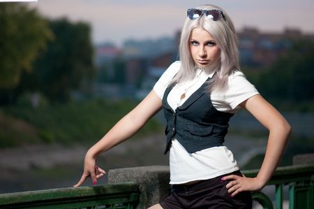 young beautiful blond woman in a parkの写真素材