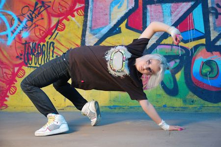 Young woman breakdancingの写真素材