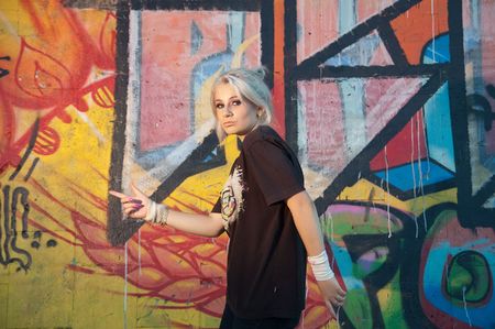 Girl break-dancer posing .の写真素材