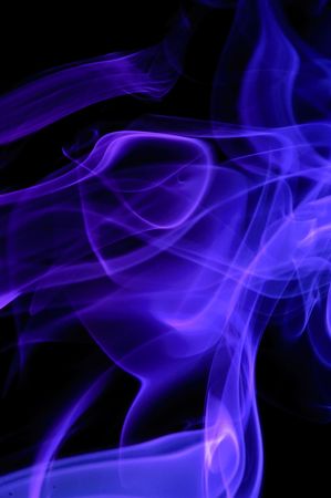Abstract blue smoke over black backgroundの写真素材