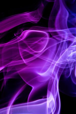 abstract multicolor smoke . black backgroundの写真素材