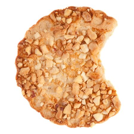 Cookies with a nut crumb. Isolated over whiteの写真素材