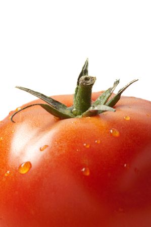 Red tomato . Isolated over white .
の写真素材