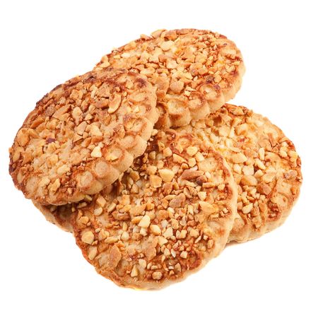 Cookies with a nut crumb. Isolated over whiteの写真素材