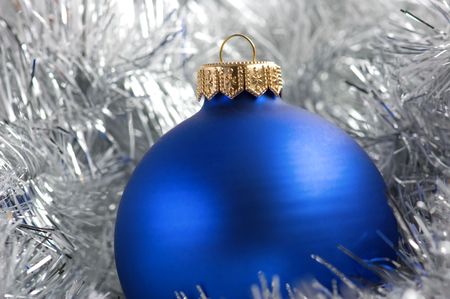 Colorful christmas balls in silver garland backgroundの写真素材