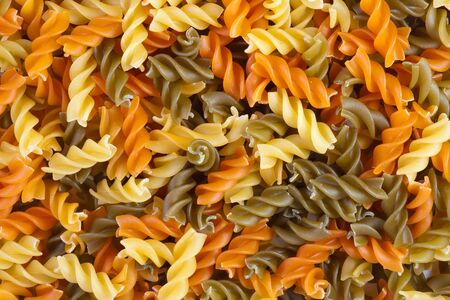 multicolor spiral macaroni. Close - up .の写真素材