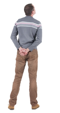 Back view of young man in sweater and jeans  looking up.   Standing young guy. Rear view people collection.  backside view of person.  Isolated over white background.の写真素材