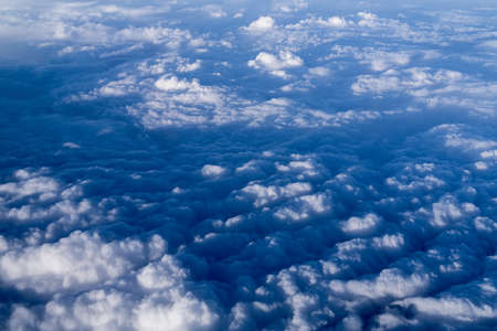 clouds. view from the window of an airplane flying in the clouds. sea â€‹â€‹of clouds...
