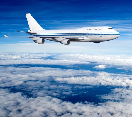 passenger airplane in the clouds  travel by air transport  flying to the top of the airliner  nobody