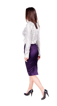 walking business woman. back view. going young girl in  suit. Rear view people collection.  back side view of person.  Isolated over white background.の写真素材