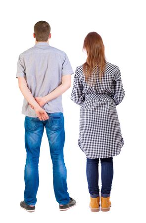 Back view of couple. beautiful friendly girl and guy together. Rear view people collection. backside view of person. Isolated over white background.の写真素材