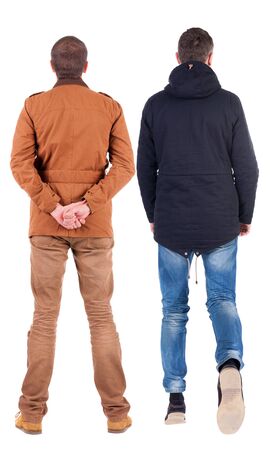 Back view of couple in winter jacket. beautiful friendly girl and guy together. Rear view people collection. backside view of person. Isolated over white background.の写真素材