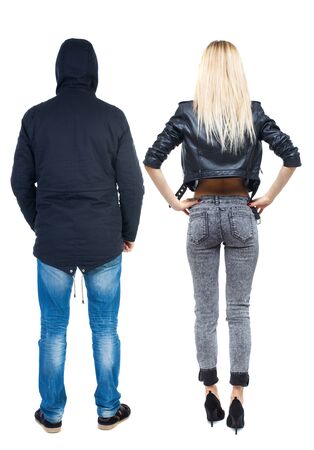 Back view of couple in winter jacket. beautiful friendly girl and guy together. Rear view people collection. backside view of person. Isolated over white background.の写真素材