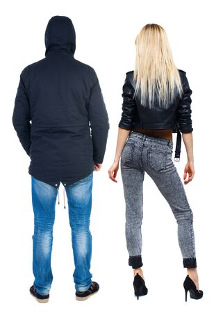 Back view of couple in winter jacket. beautiful friendly girl and guy together. Rear view people collection. backside view of person. Isolated over white background.の写真素材