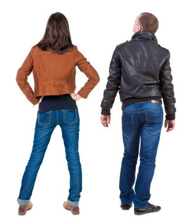 Back view of couple in winter jacket. beautiful friendly girl and guy together. Rear view people collection. backside view of person. Isolated over white background.の写真素材