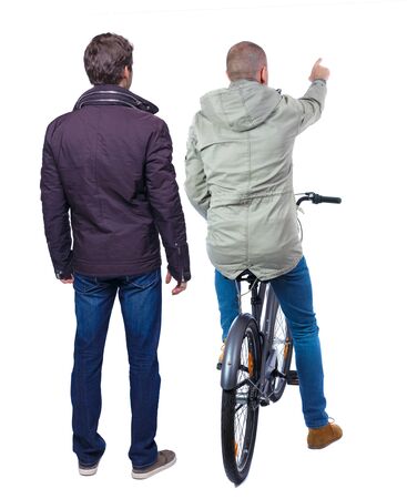 Back view of two man on a bicycle in winter jacket. Rear view people collection. backside view of person. Isolated over white background.の写真素材