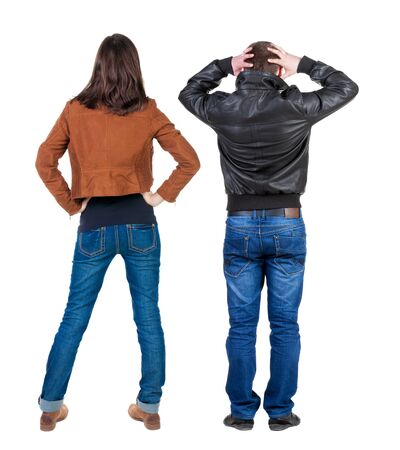 Back view of couple in winter jacket. beautiful friendly girl and guy together. Rear view people collection. backside view of person. Isolated over white background.の写真素材