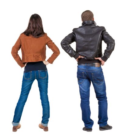 Back view of couple in winter jacket. beautiful friendly girl and guy together. Rear view people collection. backside view of person. Isolated over white background.の写真素材