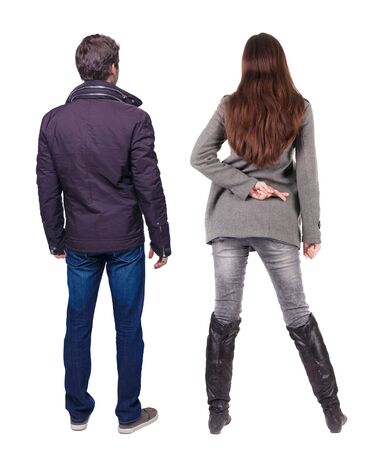 Back view of couple in winter jacket. beautiful friendly girl and guy together. Rear view people collection. backside view of person. Isolated over white background.の写真素材