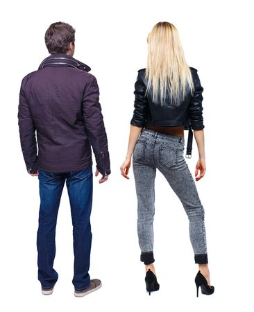 Back view of couple in winter jacket. beautiful friendly girl and guy together. Rear view people collection. backside view of person. Isolated over white background.の写真素材