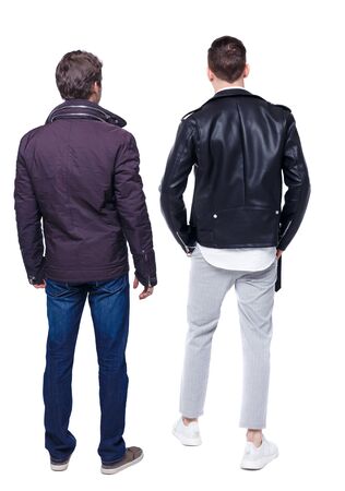 Back view of couple in winter jacket. beautiful friendly girl and guy together. Rear view people collection. backside view of person. Isolated over white background.の写真素材