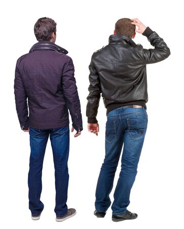 Back view of couple in winter jacket. beautiful friendly girl and guy together. Rear view people collection. backside view of person. Isolated over white background.の写真素材