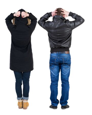 Back view of couple in winter jacket. beautiful friendly girl and guy together. Rear view people collection. backside view of person. Isolated over white background.の写真素材