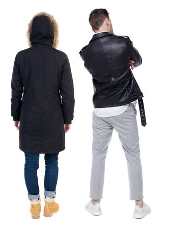 Back view of couple in winter jacket. beautiful friendly girl and guy together. Rear view people collection. backside view of person. Isolated over white background.の写真素材