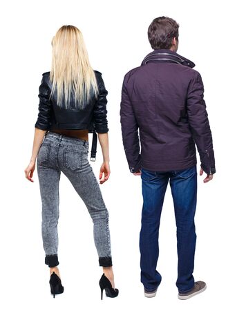 Back view of couple in winter jacket. beautiful friendly girl and guy together. Rear view people collection. backside view of person. Isolated over white background.の写真素材